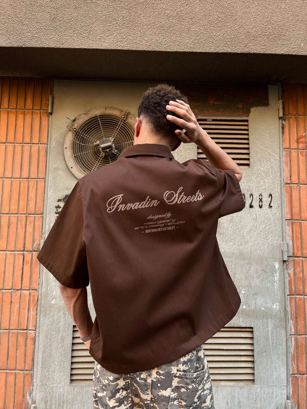 “NVDNSTRTS” boxy shirt