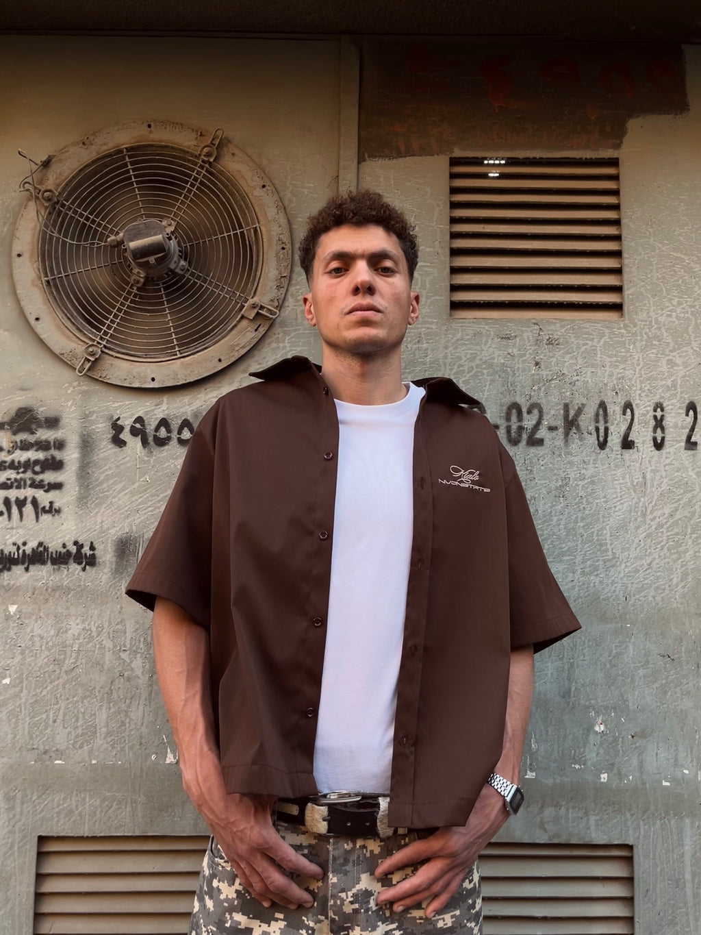 “NVDNSTRTS” boxy shirt